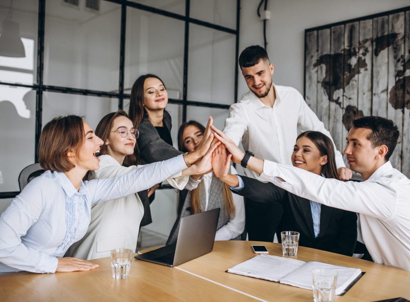 Group of people working out business plan in an office
